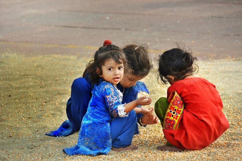 Children on the grounds of the Jama Masjid in old Delhi, INDIA