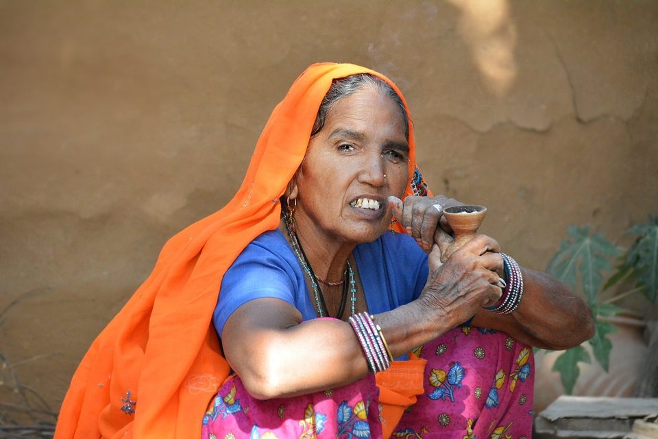 Abhaneri village woman and her clay pipe