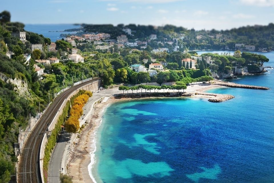 Villefranche - sur - Mer, riviera village view on train track