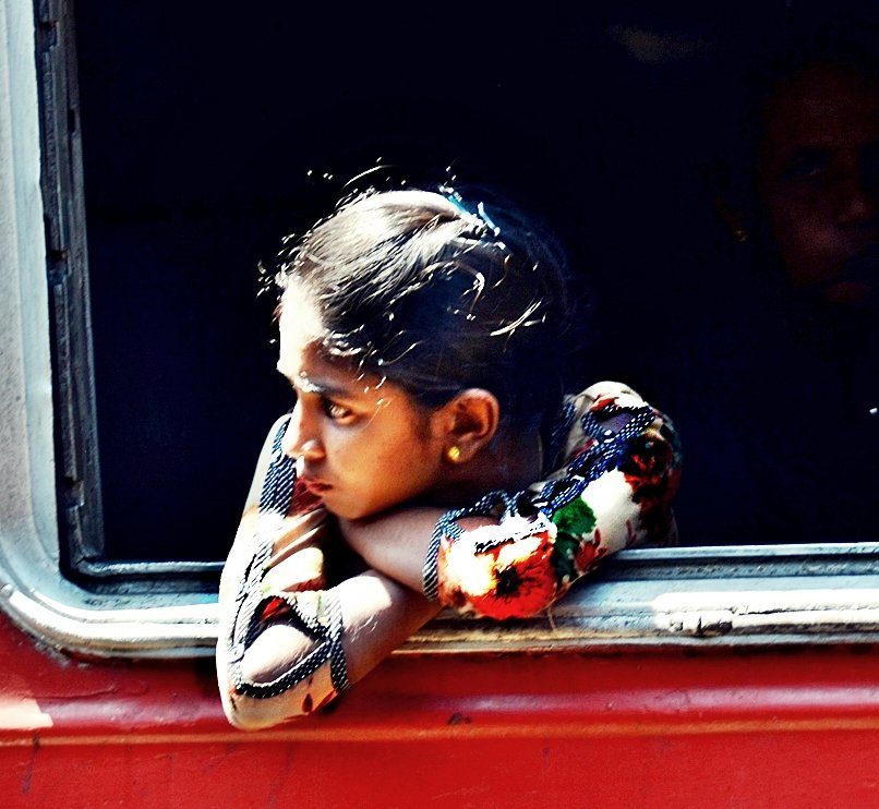 a girl on the train - Colombo station, Sri Lanka